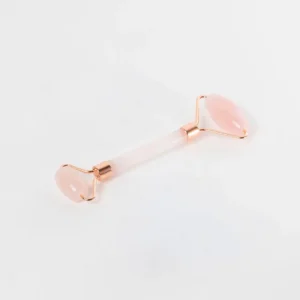 Rodillo de masaje facial de cuarzo rosa natural para cuidado de la piel